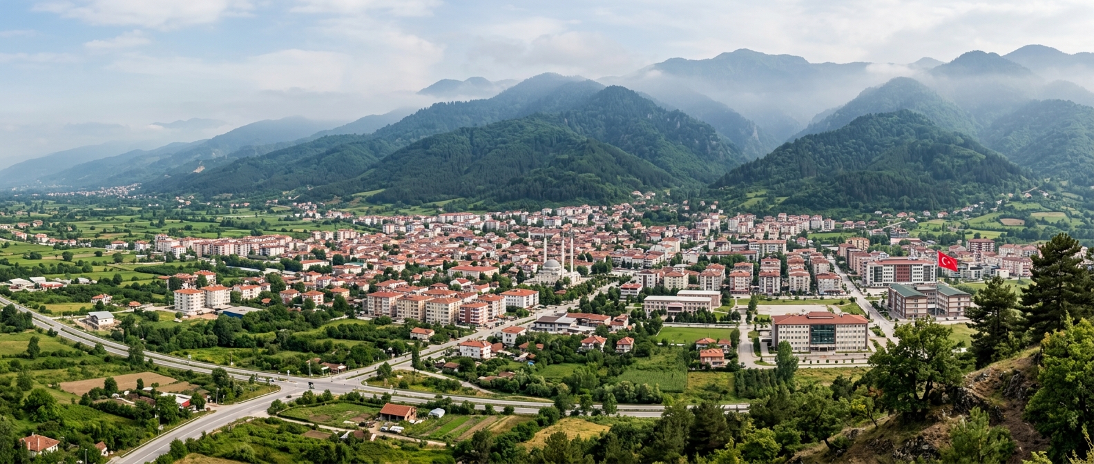 Panoramic view of Düzce city in northwestern Turkey, green plains surrounded by forested mountains, Black Sea region landscape, traditional and modern buildings, misty mountain backdrop