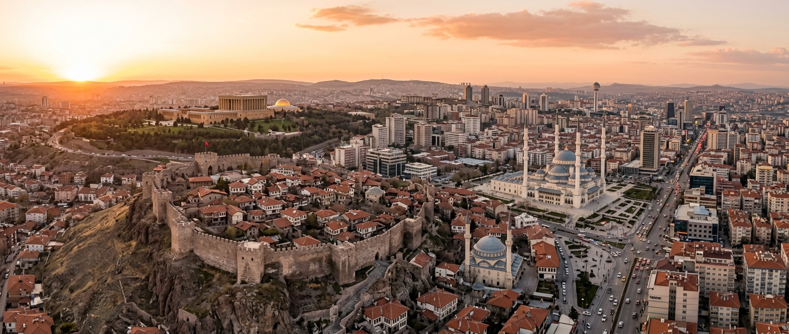 Panoramic aerial view of Ankara cityscape showing Ankara Castle on hilltop, Anitkabir mausoleum in distance, modern buildings mixed with historic architecture, Kocatepe Mosque dome visible, warm golden hour lighting